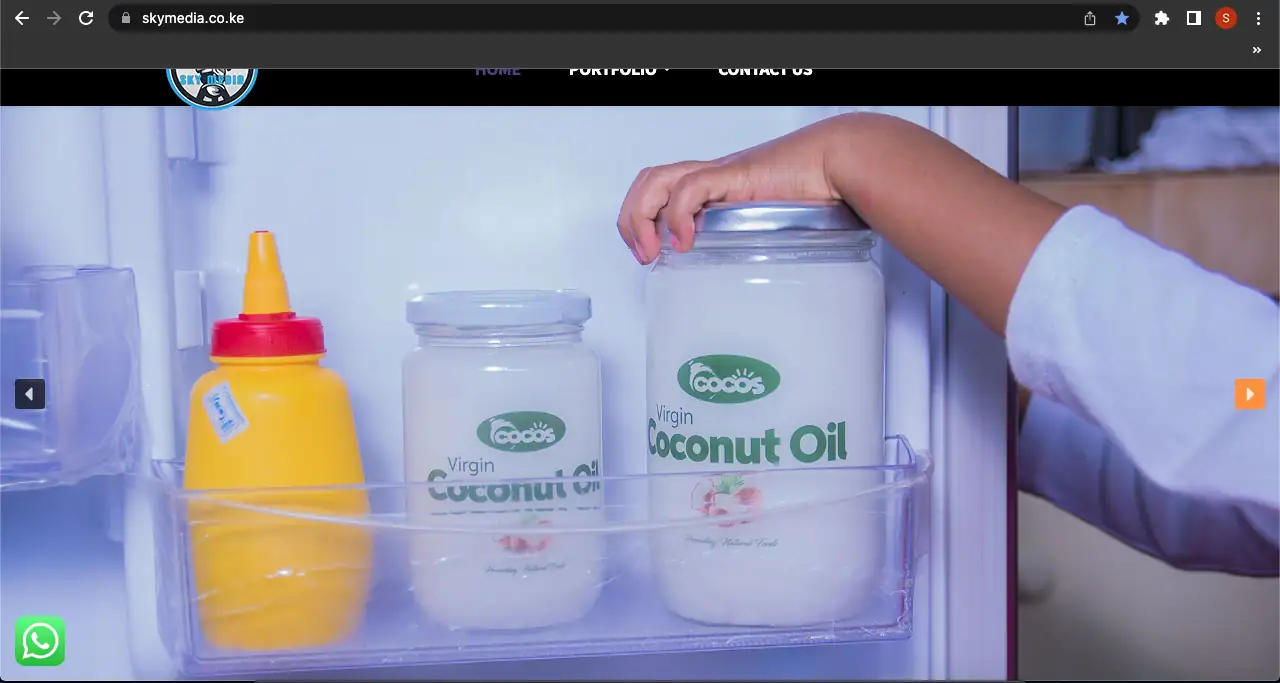 Product shot of Cocos Virgin Coconut Oil jars in a refrigerator